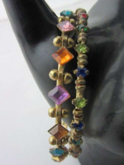 A pretty colorful pair of Indian kids bangles.