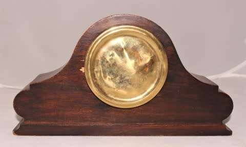 A stunning wooden antique Swiss made Buren mantel clock, in working condition!