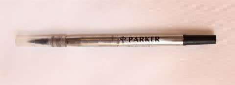 An awesome collection of four pens, including a parker refill.