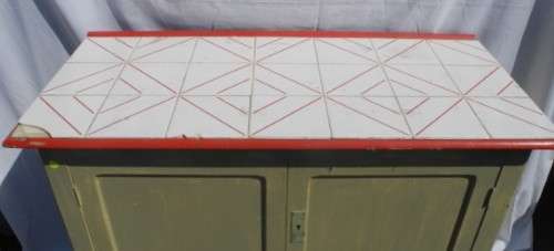 A wonderful vintage tile top multi purpose cabinet. Great restoration project!