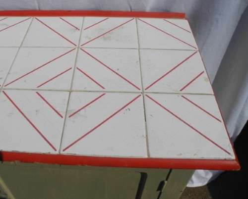 A wonderful vintage tile top multi purpose cabinet. Great restoration project!