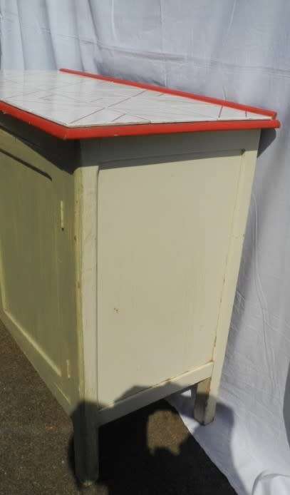 A wonderful vintage tile top multi purpose cabinet. Great restoration project!