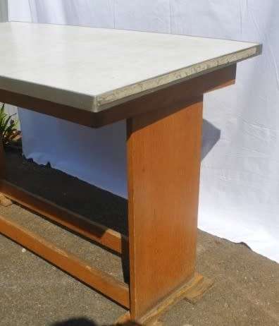 A lovely vintage multi purpose table/desk. Great restoration project!