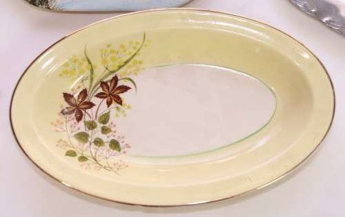 A beautiful collection of 6 plates of different shapes, sizes and designs. perfect wall display!