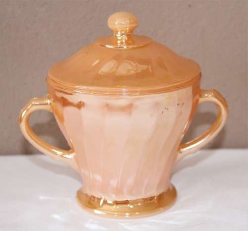 GORGEOUS electric orange tea set including 4 duos, milk jug and sugar pot.