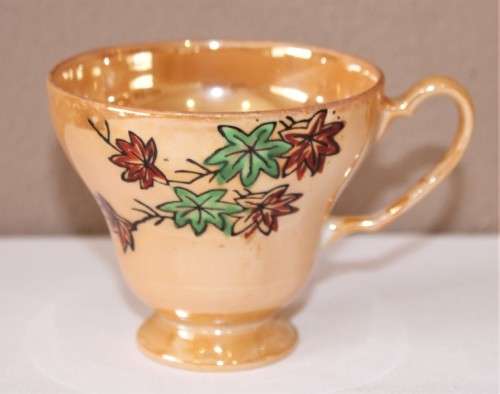 GORGEOUS electric orange tea set including 4 duos, milk jug and sugar pot.