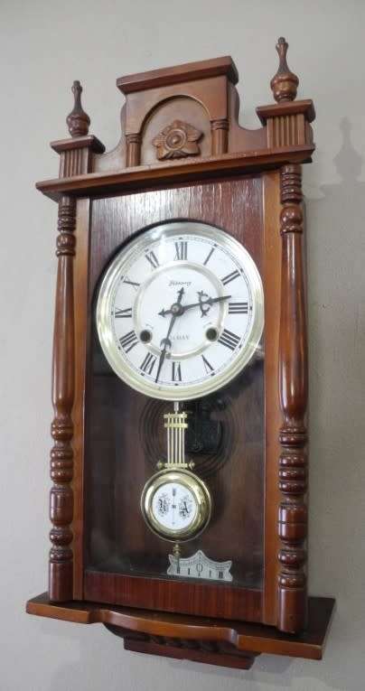 BARGAIN CLOCKS!!A vintage Blessing 31 day clock in a wood wall casing. Lifespace Sale