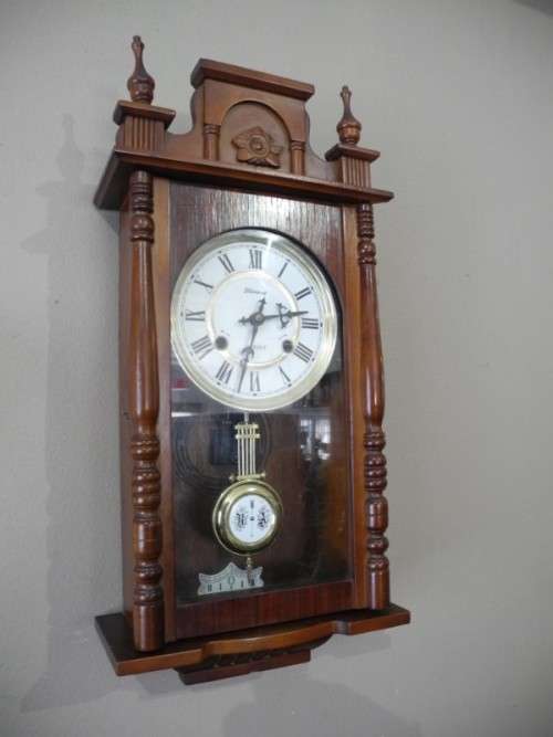 BARGAIN CLOCKS!!A vintage Blessing 31 day clock in a wood wall casing. Lifespace Sale
