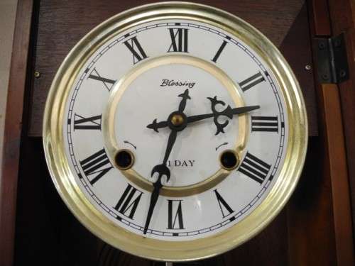 BARGAIN CLOCKS!!A vintage Blessing 31 day clock in a wood wall casing. Lifespace Sale