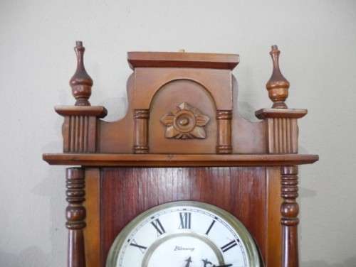 BARGAIN CLOCKS!!A vintage Blessing 31 day clock in a wood wall casing. Lifespace Sale