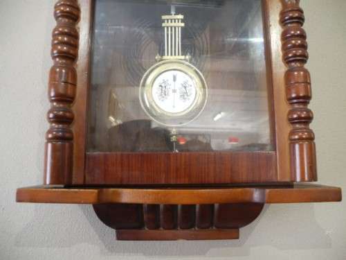 BARGAIN CLOCKS!!A vintage Blessing 31 day clock in a wood wall casing. Lifespace Sale