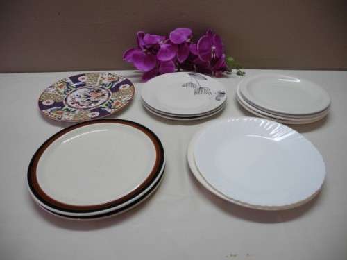 A colourful collection of various plates of different styles on a mixed table-Lifespace Sale