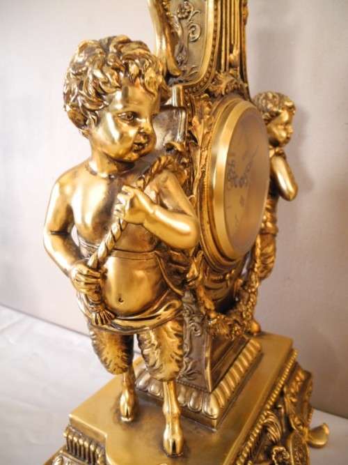 A magnificent 3 Piece French gold resin Clock Garniture, with a Juliana Quartz clock Beautiful!!!
