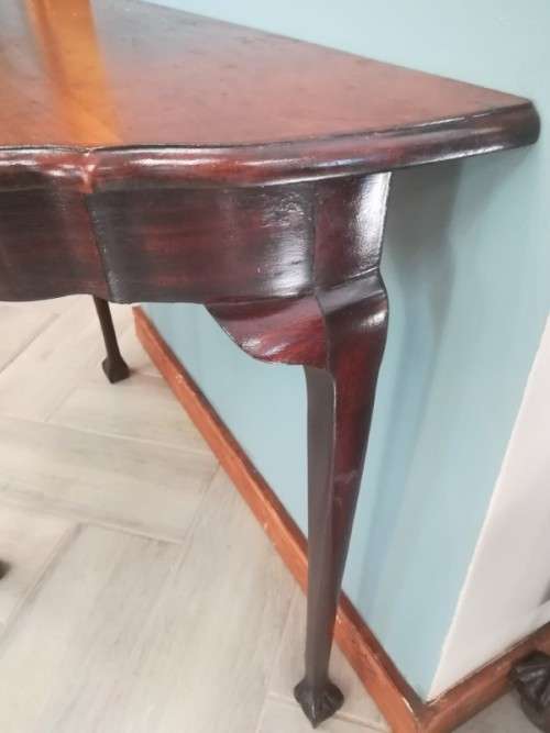 A  vintage solid Imbuia scalloped edge ball & claw half moon display/ occ table.Xmas sale