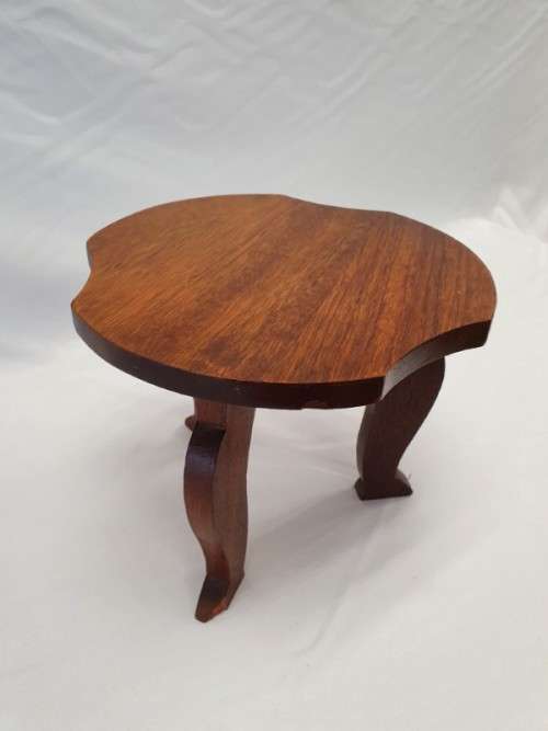 A fantastic vintage solid teak milking stool w beautiful shaped wood top in fantastic condition!!!