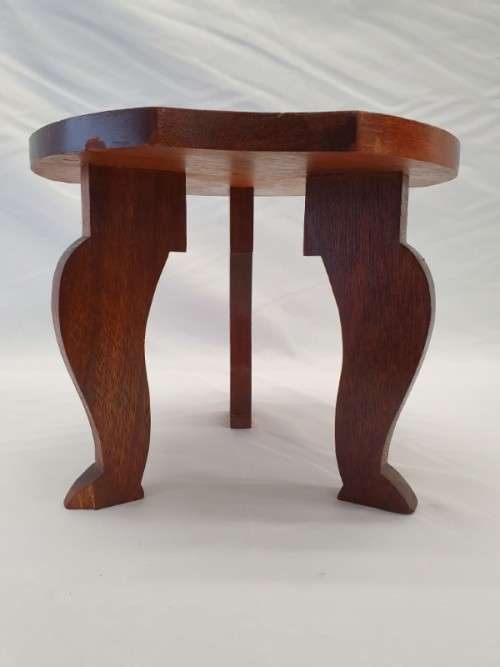 A fantastic vintage solid teak milking stool w beautiful shaped wood top in fantastic condition!!!