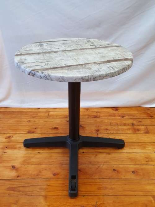 A lovely cafe style round table with newspaper print for indoor or outdoor use.-Xmas sale