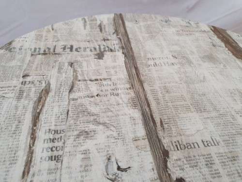 A lovely cafe style round table with newspaper print for indoor or outdoor use.-Xmas sale