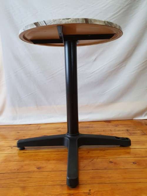 A lovely cafe style round table with newspaper print for indoor or outdoor use.-Xmas sale