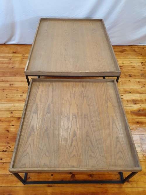 A stylish Oak veneer double coffee table set on metal legs-Xmas sale