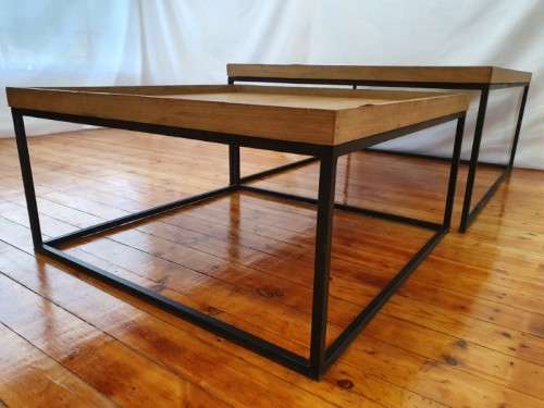 A stylish Oak veneer double coffee table set on metal legs-Xmas sale