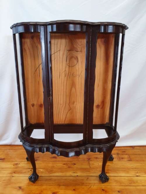 A lovely "Kenbow" curved ball and claw display cabinet, needs glass and shelves.Xmas sale