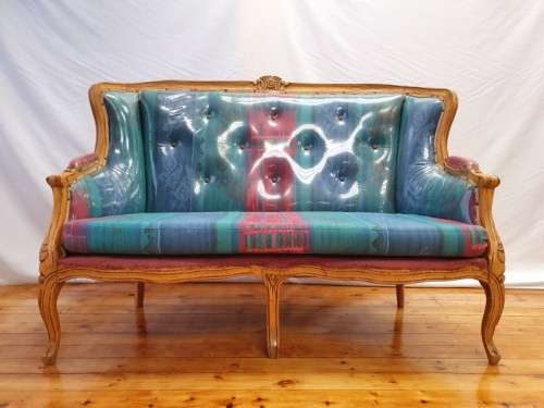 A well made antique Victorian 2 seater settee couch w carved detailing. Xmas sale