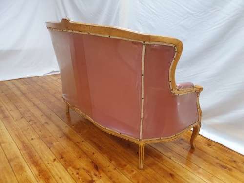 A well made antique Victorian 2 seater settee couch w carved detailing. Xmas sale