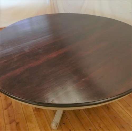 A stunning large dark wood and white base round dining table (167cm x 76cm). Xmas sale