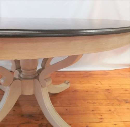 A stunning large dark wood and white base round dining table (167cm x 76cm). Xmas sale