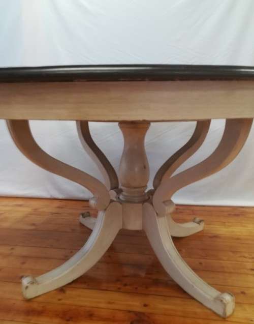 A stunning large dark wood and white base round dining table (167cm x 76cm). Xmas sale
