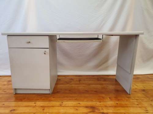 A modern melamine top desk with a pull out keyboard drawer. Xmas sale
