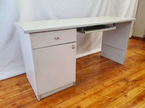 A modern melamine top desk with a pull out keyboard drawer. Xmas sale