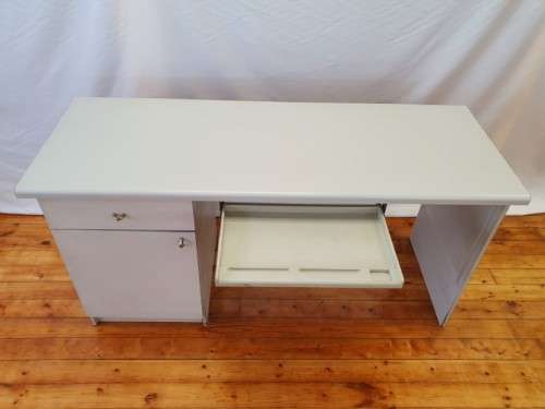 A modern melamine top desk with a pull out keyboard drawer. Xmas sale