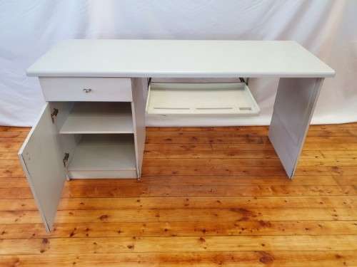 A modern melamine top desk with a pull out keyboard drawer. Xmas sale