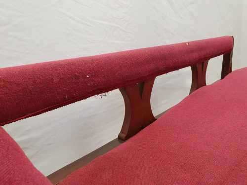 An Edwardian rail-back upholstered Chaise Lounge