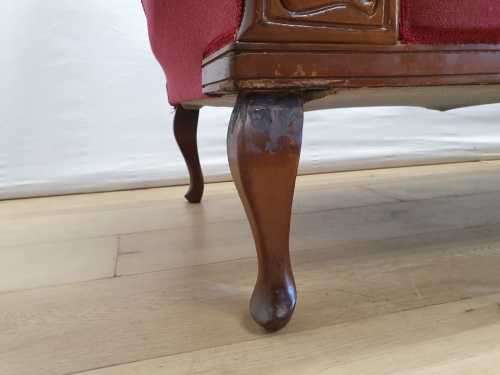 An Edwardian rail-back upholstered Chaise Lounge