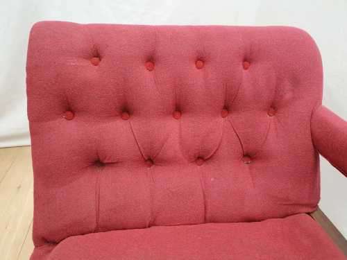 An Edwardian rail-back upholstered Chaise Lounge