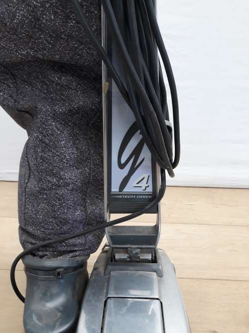 A Kirby vacuum cleaner in working order and a spare for parts (not working)