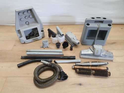 A Kirby vacuum cleaner in working order with extra attachments