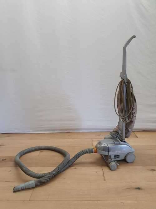 A Kirby vacuum cleaner in working order with extra attachments