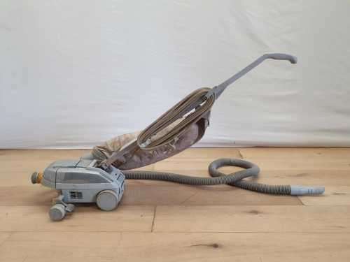 A Kirby vacuum cleaner in working order with extra attachments