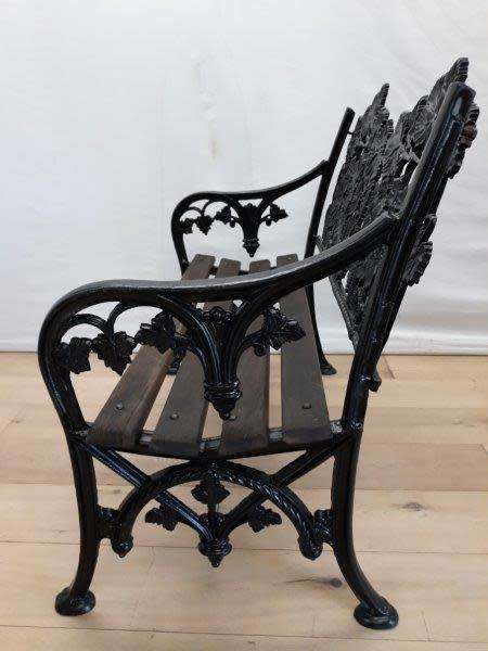 A cast iron "MFM Zimbabwe" slatted wood all weather garden/ patio bench.
