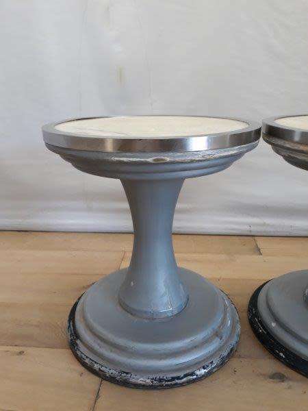 A set of two Marble top round occasional tables