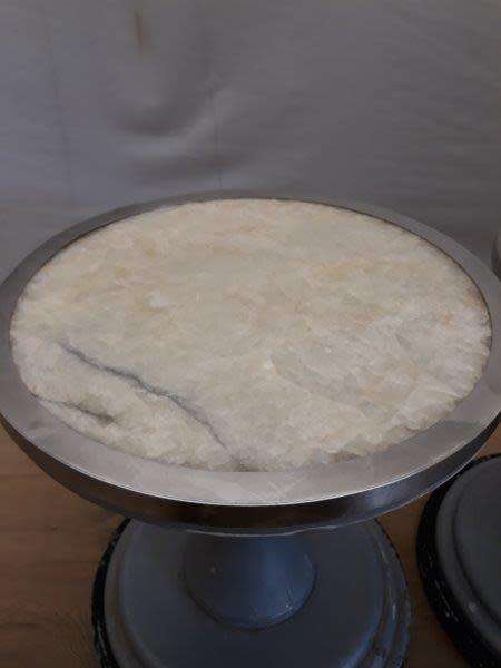 A set of two Marble top round occasional tables