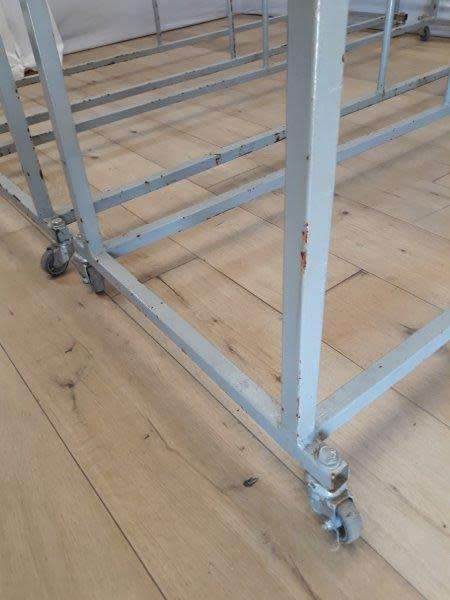 3 industrial size metal clothes hanging rails on wheels