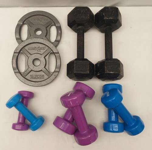An awesome collection of assorted gym dumbbells and weights ranging in weights between 1kg and 7.5kg