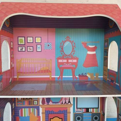 An incredible large (115cm high) dolls house with various rooms and dolls house funiture