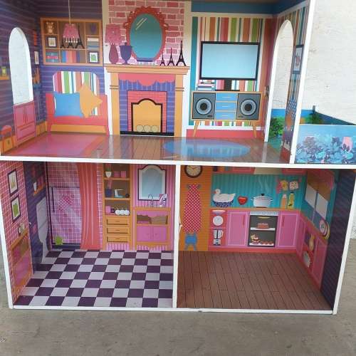 An incredible large (115cm high) dolls house with various rooms and dolls house funiture