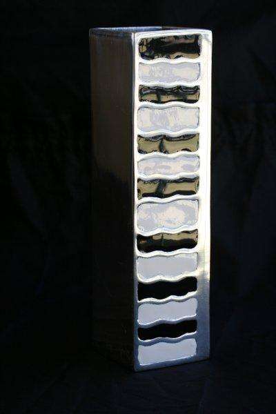 A STUNNING METAL VASE!!! VERY COOL...